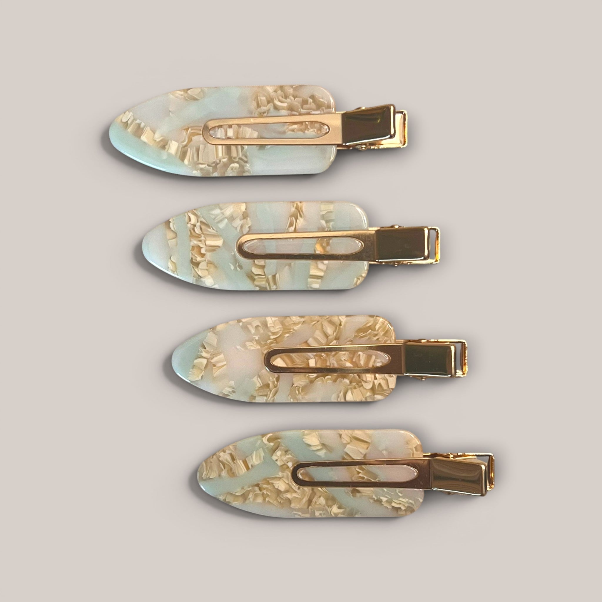 No-crease styling hair clips with polished gold-tone clasps