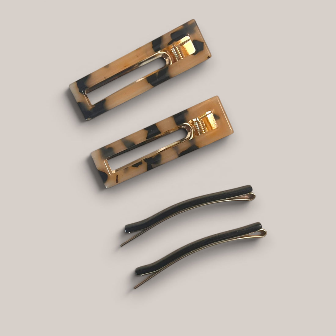 White tortoiseshell and black acetate hair clip set