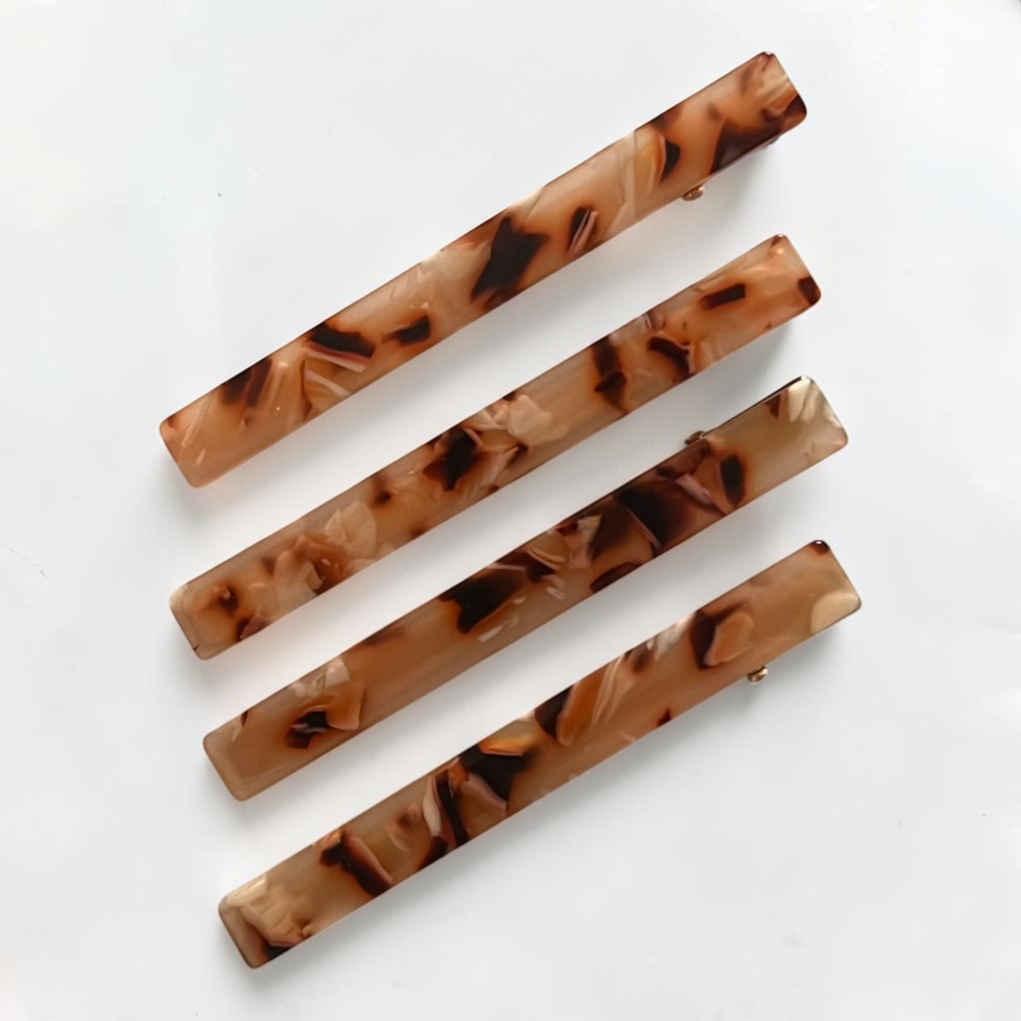Slim acetate barrette set in amber tortoise finish