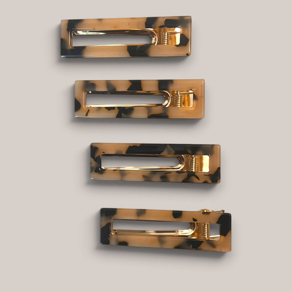 Set of four rectangular tortoise hair clips with gold-tone clasp